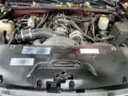 ✅ 2002 GMC Sierra 1500HD SLE • VIN: 1GTGK13U32F137446 • Лот: 82978294. Опубликован ранее на Copart с пробегом 144 560 миль. Бесплатный доступ к архиву аукционных продаж из США и подробный отчёт об истории автомобиля на DreamBid. Изображение 13.