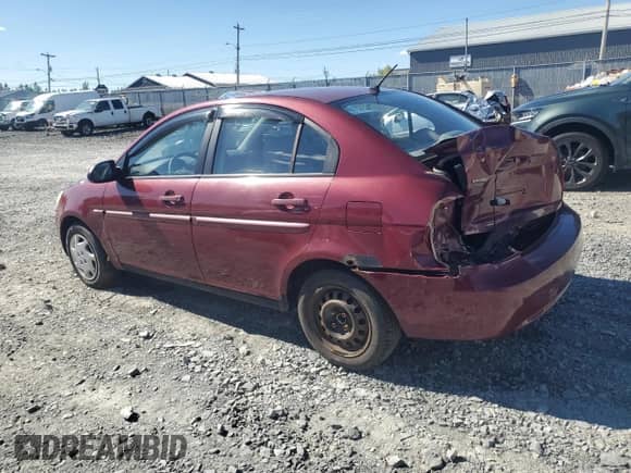 2006 Hyundai Accent GL z VIN KMHCN45C26U052459, wystawiony jako Copart lot #84417075 z przebiegiem 247 312 mil mil oraz Szkoda całkowita • Salvage title. Historia ofert i sprzedaży dostępna na DreamBid. Obrazek 2.