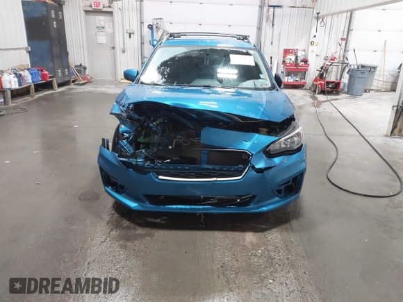 ✅ 2018 Subaru Impreza Premium • VIN: 4S3GTAB69J3713010 • Lot: 43599160. Listed on IAAI with 43,964 mi. Free auction sales archive from the USA and detailed vehicle history report at DreamBid. Image 12.