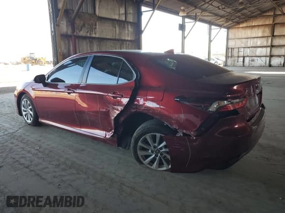 ✅ 2021 Toyota Camry LE • VIN: 4T1C11AK2MU577039 • Lot: 92267255. Listed on Copart with 90,989 mi. Free auction sales archive from the USA and detailed vehicle history report at DreamBid. Image 2.
