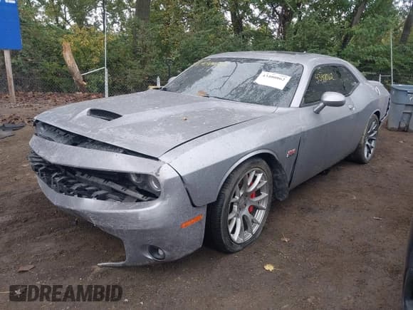 ✅ 2016 Dodge Challenger SRT 392 • VIN: 2C3CDZDJ2GH125200 • Lot: 43400862. Wystawiony na IAAI z przebiegiem 56 605 mil. Bezpłatny archiwum sprzedaży aukcyjnych z USA i szczegółowy raport historii pojazdu na DreamBid. Zdjęcie 16.