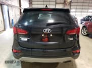 ✅ 2017 Hyundai Santa Fe 2.4L • VIN: 5NMZUDLB9HH023028 • Лот: 63816043. Опубликован ранее на Copart с пробегом 59 092 миль. Бесплатный доступ к архиву аукционных продаж из США и подробный отчёт об истории автомобиля на DreamBid. Изображение 6.