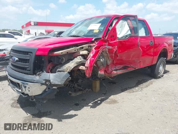 ✅ 2014 Ford F-150 XL • VIN: 1FTFW1EF1EKG52052 • Lot: 42799627. Listed on IAAI with 188,050 mi. Free auction sales archive from the USA and detailed vehicle history report at DreamBid. Image 2.