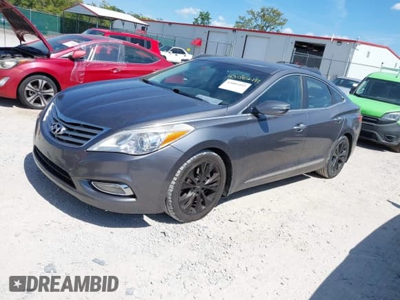 ✅ 2013 Hyundai Azera • VIN: KMHFG4JG2DA214332 • Lot: 43085492. Wystawiony na IAAI z przebiegiem 97 689 mil. Bezpłatny archiwum sprzedaży aukcyjnych z USA i szczegółowy raport historii pojazdu na DreamBid. Zdjęcie 2.