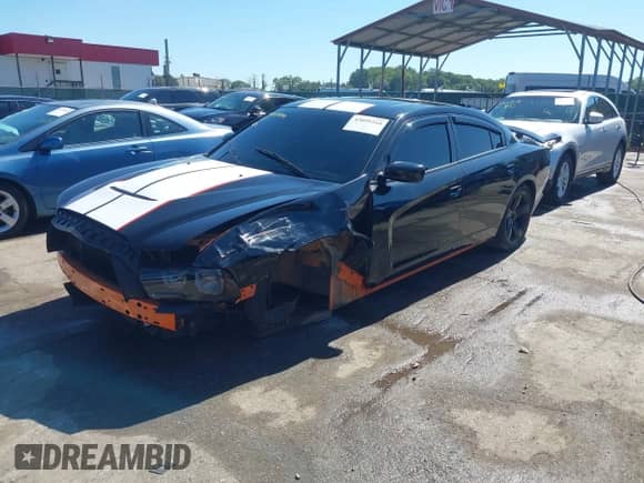 ✅ 2014 Dodge Charger RT • VIN: 2C3CDXCT3EH283596 • Lot: 43059244. Wystawiony na IAAI z przebiegiem 102 322 mil. Bezpłatny archiwum sprzedaży aukcyjnych z USA i szczegółowy raport historii pojazdu na DreamBid. Zdjęcie 2.