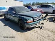 ✅ 1998 Dodge Dakota SLT • VIN: 1B7GL22XXWS571049 • Lot: 75878644. Wystawiony na Copart z przebiegiem Nie podano. Bezpłatny archiwum sprzedaży aukcyjnych z USA i szczegółowy raport historii pojazdu na DreamBid. Zdjęcie 11.