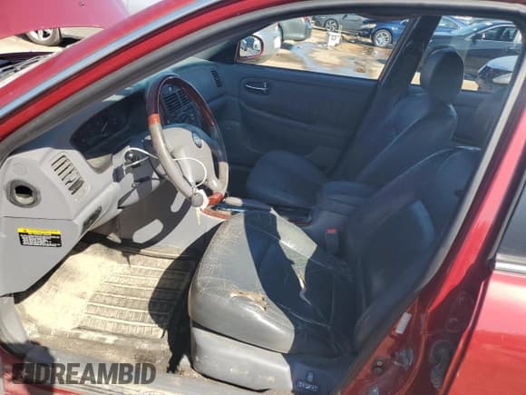 ✅ 2004 Kia Optima LX • VIN: KNAGD128145295918 • Лот: 64577055. Опубликован ранее на Copart с пробегом 166 206 миль. Бесплатный доступ к архиву аукционных продаж из США и подробный отчёт об истории автомобиля на DreamBid. Изображение 7.