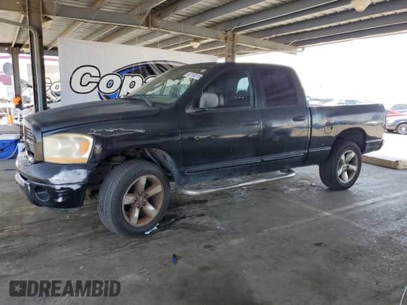 2006 Dodge 1500 Laramie z VIN 1D7HU18236S649961, wystawiony jako Copart lot #60153015 z przebiegiem 231 666 mil mil oraz Szkoda całkowita • Salvage title. Historia ofert i sprzedaży dostępna na DreamBid. Obrazek 1.