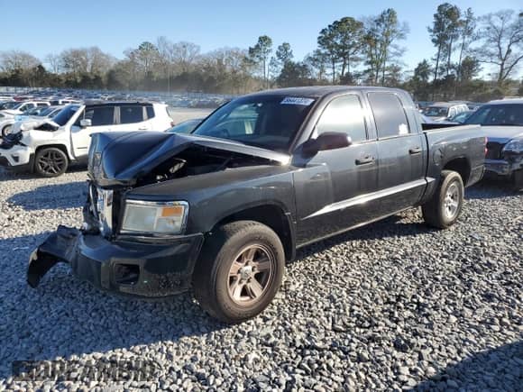 2008 Dodge Dakota SLT z VIN 1D7HE48K18S561928, wystawiony jako Copart lot #86441374 z przebiegiem 169 333 mil mil oraz Szkoda całkowita • Salvage title. Historia ofert i sprzedaży dostępna na DreamBid. Obrazek 1.