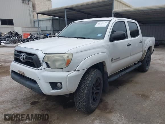 ✅ 2015 Toyota Tacoma PreRunner • VIN: 5TFJU4GN6FX070412 • Lot: 42308629. Listed on IAAI with 103,972 mi. Free auction sales archive from the USA and detailed vehicle history report at DreamBid. Image 2.