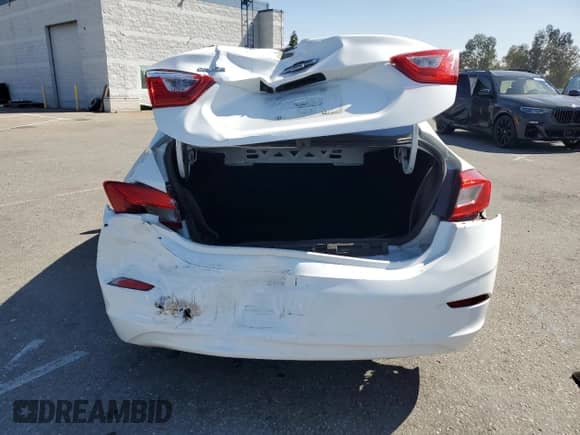 2018 Chevrolet Cruze LS z VIN 1G1BC5SM1J7180037, wystawiony jako Copart lot #71641325 z przebiegiem 143 272 mil mil oraz Szkoda całkowita • Salvage title. Historia ofert i sprzedaży dostępna na DreamBid. Obrazek 6.