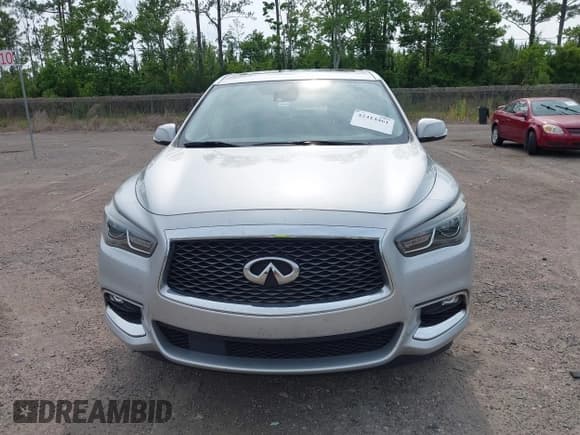 ✅ 2020 Infiniti QX60 Luxe • VIN: 5N1DL0MN9LC528083 • Lot: 42414461. Listed on IAAI with 87,812 mi. Free auction sales archive from the USA and detailed vehicle history report at DreamBid. Image 12.