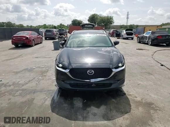 ✅ 2023 Mazda CX-30 S Carbon Edition • VIN: 3MVDMBCM2PM572015 • Lot: 60109135. Listed on Copart with 27,790 mi. Free auction sales archive from the USA and detailed vehicle history report at DreamBid. Image 15.