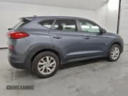 ✅ 2021 Hyundai Tucson SE • VIN: KM8J23A46MU312481 • Лот: 91110385. Опубликован ранее на Copart с пробегом 145 919 миль. Бесплатный доступ к архиву аукционных продаж из США и подробный отчёт об истории автомобиля на DreamBid. Изображение 3.