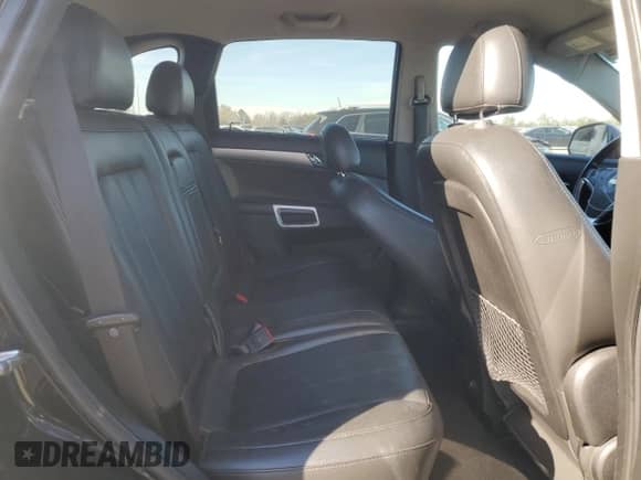 2012 Chevrolet Captiva Sport LT z VIN 3GNAL3E5XCS613703, wystawiony jako Copart lot #83405654 z przebiegiem 128 792 mil mil oraz Szkoda całkowita • Salvage title. Historia ofert i sprzedaży dostępna na DreamBid. Obrazek 11.