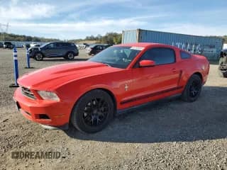 ✅ 2012 Ford Mustang V6 • VIN: 1ZVBP8AM0C5209974 • Lot: 90703935. Listed on Copart with 185,527 mi. Free auction sales archive from the USA and detailed vehicle history report at DreamBid. Image 1.