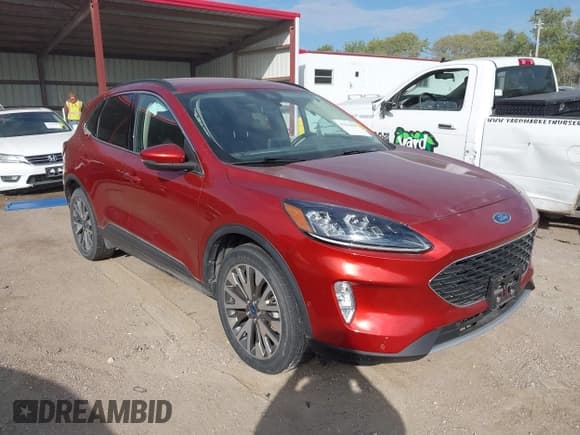 ✅ 2020 Ford Escape Titanium • VIN: 1FMCU9J97LUB10880 • Lot: 43414889. Listed on IAAI with 56,415 mi. Free auction sales archive from the USA and detailed vehicle history report at DreamBid. Image 1.