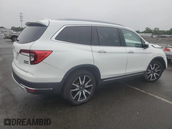 ✅ 2022 Honda Pilot Touring 8-Passenger • VIN: 5FNYF6H91NB009631 • Лот: 61056075. Опубликован ранее на Copart с пробегом 108 699 миль. Бесплатный доступ к архиву аукционных продаж из США и подробный отчёт об истории автомобиля на DreamBid. Изображение 3.
