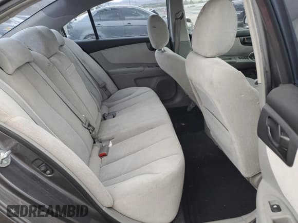 ✅ 2008 Kia Optima EX • VIN: KNAGE124185215405 • Lot: 70379555. Listed on Copart with 220,509 mi. Free auction sales archive from the USA and detailed vehicle history report at DreamBid. Image 10.