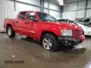 2008 Dodge Dakota z VIN 1D7HW68K58S581897, wystawiony jako Copart lot #81428034 z przebiegiem 106 776 mil mil oraz Szkoda całkowita • Salvage title. Historia ofert i sprzedaży dostępna na DreamBid. Obrazek 4.