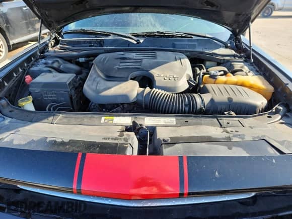 2014 Dodge Challenger SXT z VIN 2C3CDYAG5EH100467, wystawiony jako Copart lot #85343015 z przebiegiem 169 078 mil mil oraz Szkoda całkowita • Salvage title. Historia ofert i sprzedaży dostępna na DreamBid. Obrazek 11.