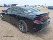 ✅ 2019 Dodge Charger R/T • VIN: 2C3CDXCTXKH630059 • Lot: 43220425. Listed on IAAI with 117,464 mi. Free auction sales archive from the USA and detailed vehicle history report at DreamBid. Image 3.