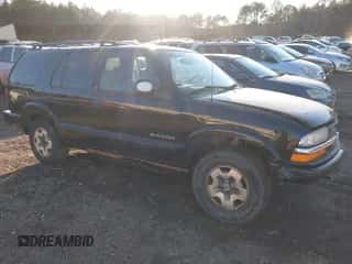 2002 Chevrolet Blazer LS with VIN 1GNDT13W92K208195, listed as a IAAI auction lot 41252604 with 141,235 mi miles and . Bid and sale history available at DreamBid. Image 1.
