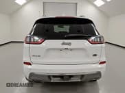 ✅ 2019 Jeep Cherokee Overland • VIN: 1C4PJMJN8KD255889 • Lot: 92038095. Listed on Copart with 128,092 mi. Free auction sales archive from the USA and detailed vehicle history report at DreamBid. Image 6.