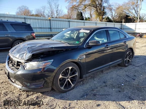 ✅ 2014 Ford Taurus SEL • VIN: 1FAHP2E98EG173884 • Лот: 93109525. Опубликован ранее на Copart с пробегом 165 334 миль. Бесплатный доступ к архиву аукционных продаж из США и подробный отчёт об истории автомобиля на DreamBid. Изображение 1.
