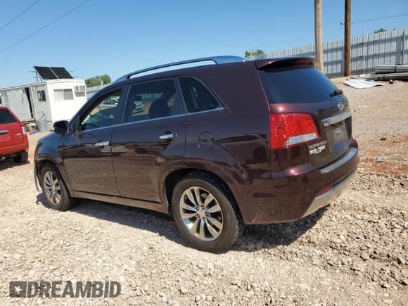 ✅ 2012 Kia Sorento SX • VIN: 5XYKW4A20CG265935 • Lot: 80266425. Listed on Copart with 191,135 mi. Free auction sales archive from the USA and detailed vehicle history report at DreamBid. Image 2.