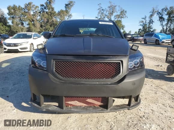 ✅ 2012 Dodge Caliber SXT • VIN: 1C3CDWDA4CD510411 • Лот: 41508725. Опубликован ранее на Copart с пробегом 97 328 миль. Бесплатный доступ к архиву аукционных продаж из США и подробный отчёт об истории автомобиля на DreamBid. Изображение 5.