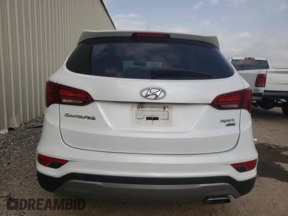 ✅ 2017 Hyundai Santa Fe 2.4L • VIN: 5XYZTDLB8HG438189 • Лот: 43794553. Опубликован ранее на Copart с пробегом 106 443 миль. Бесплатный доступ к архиву аукционных продаж из США и подробный отчёт об истории автомобиля на DreamBid. Изображение 6.