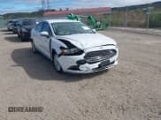 ✅ 2014 Ford Fusion S Hybrid • VIN: 3FA6P0UU1ER368851 • Лот: 43427270. Опубликован ранее на IAAI с пробегом 63 620 миль. Бесплатный доступ к архиву аукционных продаж из США и подробный отчёт об истории автомобиля на DreamBid. Изображение 1.
