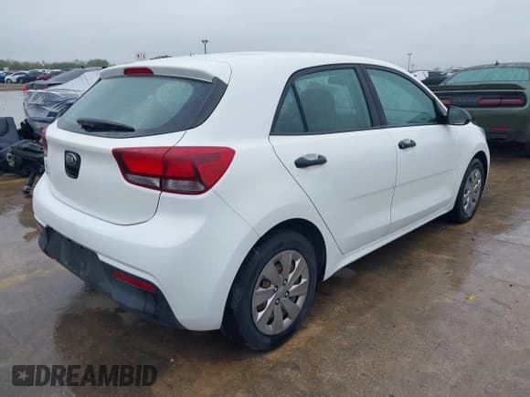 ✅ 2018 Kia Rio LX • VIN: 3KPA25AB5JE047903 • Lot: 41102000. Listed on IAAI with 127,963 mi. Free auction sales archive from the USA and detailed vehicle history report at DreamBid. Image 4.