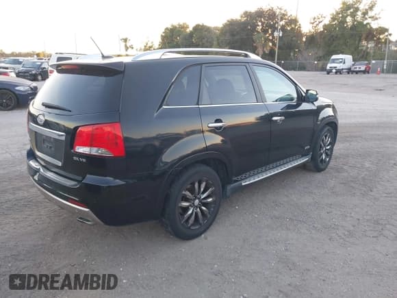 ✅ 2012 Kia Sorento SX • VIN: 5XYKWDA25CG309542 • Lot: 43845824. Listed on IAAI with 256,255 mi. Free auction sales archive from the USA and detailed vehicle history report at DreamBid. Image 4.