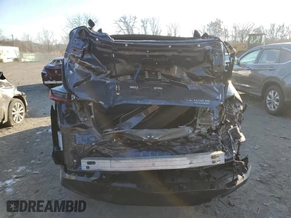 ✅ 2023 Lexus RZ 450e Premium • VIN: JTJAAAAB7PA014910 • Lot: 82283924. Wystawiony na Copart z przebiegiem 33 673 mil. Bezpłatny archiwum sprzedaży aukcyjnych z USA i szczegółowy raport historii pojazdu na DreamBid. Zdjęcie 6.