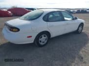 ✅ 1996 Ford Taurus GL • VIN: 1FALP52U3TG166939 • Lot: 43633645. Wystawiony na IAAI z przebiegiem 159 788 mil. Bezpłatny archiwum sprzedaży aukcyjnych z USA i szczegółowy raport historii pojazdu na DreamBid. Zdjęcie 4.