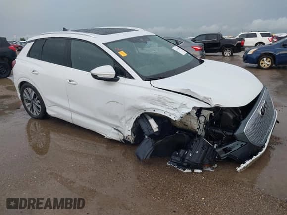 ✅ 2023 Audi Q4 e-tron • VIN: WA1ACBFZ2PP058412 • Lot: 42164300. Wystawiony na IAAI z przebiegiem 26 562 mil. Bezpłatny archiwum sprzedaży aukcyjnych z USA i szczegółowy raport historii pojazdu na DreamBid. Zdjęcie 1.