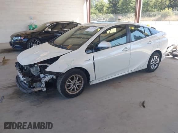 ✅ 2016 Toyota Prius Four • VIN: JTDKARFUXG3012069 • Lot: 42759381. Listed on IAAI with 152,954 mi. Free auction sales archive from the USA and detailed vehicle history report at DreamBid. Image 2.