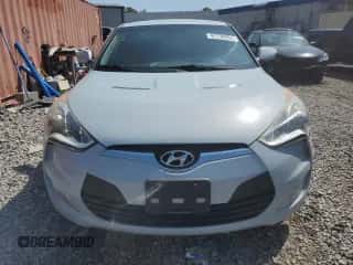 2015 Hyundai Veloster z VIN KMHTC6AD9FU223479, wystawiony jako Copart lot #67728954 z przebiegiem 110 504 mil mil oraz Szkoda całkowita • Salvage title. Historia ofert i sprzedaży dostępna na DreamBid. Obrazek 5.