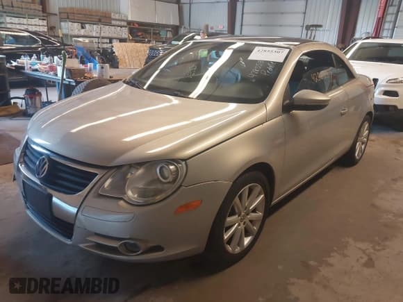 ✅ 2009 Volkswagen Eos Komfort • VIN: WVWBA71F09V021898 • Lot: 42855307. Listed on IAAI with 198,528 mi. Free auction sales archive from the USA and detailed vehicle history report at DreamBid. Image 2.