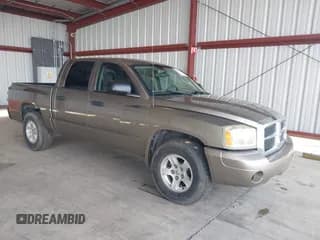 ✅ 2007 Dodge Dakota SLT • VIN: 1D7HE48N17S144088 • Лот: 40577462. Опубликован ранее на IAAI с пробегом 192 502 миль. Бесплатный доступ к архиву аукционных продаж из США и подробный отчёт об истории автомобиля на DreamBid. Изображение 1.
