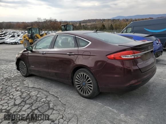 ✅ 2017 Ford Fusion Hybrid Titanium • VIN: 3FA6P0RU7HR139815 • Lot: 91671485. Listed on Copart with 164,683 mi. Free auction sales archive from the USA and detailed vehicle history report at DreamBid. Image 2.