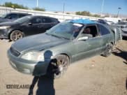 ✅ 2000 Honda Civic EX • VIN: 1HGEJ8245YL020497 • Лот: 71371755. Опубликован ранее на Copart с пробегом 181 511 миль. Бесплатный доступ к архиву аукционных продаж из США и подробный отчёт об истории автомобиля на DreamBid. Изображение 1.