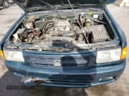 ✅ 1998 Honda Passport LX • VIN: 4S6CM58W2W4403473 • Lot: 66621474. Listed on Copart with 154,892 mi. Free auction sales archive from the USA and detailed vehicle history report at DreamBid. Image 12.