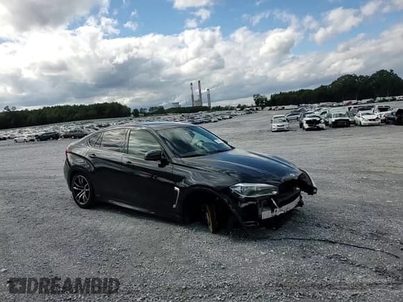 ✅ 2015 BMW X6 M • VIN: 5YMKW8C55F0G93843 • Lot: 73421384. Listed on Copart with 77,520 mi. Free auction sales archive from the USA and detailed vehicle history report at DreamBid. Image 12.