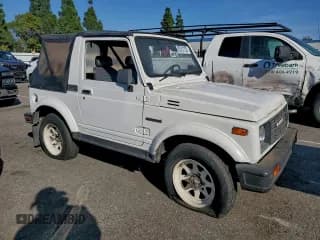 ✅ 1988 Suzuki Samurai • VIN: JS4JC51C2J4216375 • Lot: 93251155. Wystawiony na Copart z przebiegiem 47 665 mil. Bezpłatny archiwum sprzedaży aukcyjnych z USA i szczegółowy raport historii pojazdu na DreamBid. Zdjęcie 4.