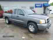 2006 Dodge Dakota SLT with VIN 1D7HW42N26S501704, listed as a Copart auction lot 57629665 with 116,183 mi miles and Salvage title. Bid and sale history available at DreamBid. Image 4.