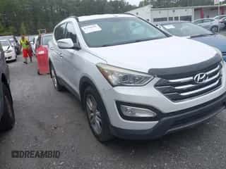 2014 Hyundai Santa Fe z VIN 5XYZU3LA6EG223937, wystawiony jako IAAI lot #43298591 z przebiegiem 130 000 mil mil oraz . Historia ofert i sprzedaży dostępna na DreamBid. Obrazek 1.