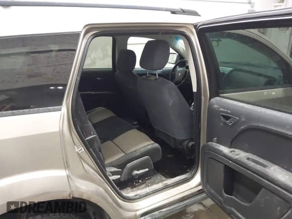 2009 Dodge Journey SE z VIN 3D4GG47B99T561583, wystawiony jako IAAI lot #43402002 z przebiegiem 137 189 mil mil oraz . Historia ofert i sprzedaży dostępna na DreamBid. Obrazek 8.